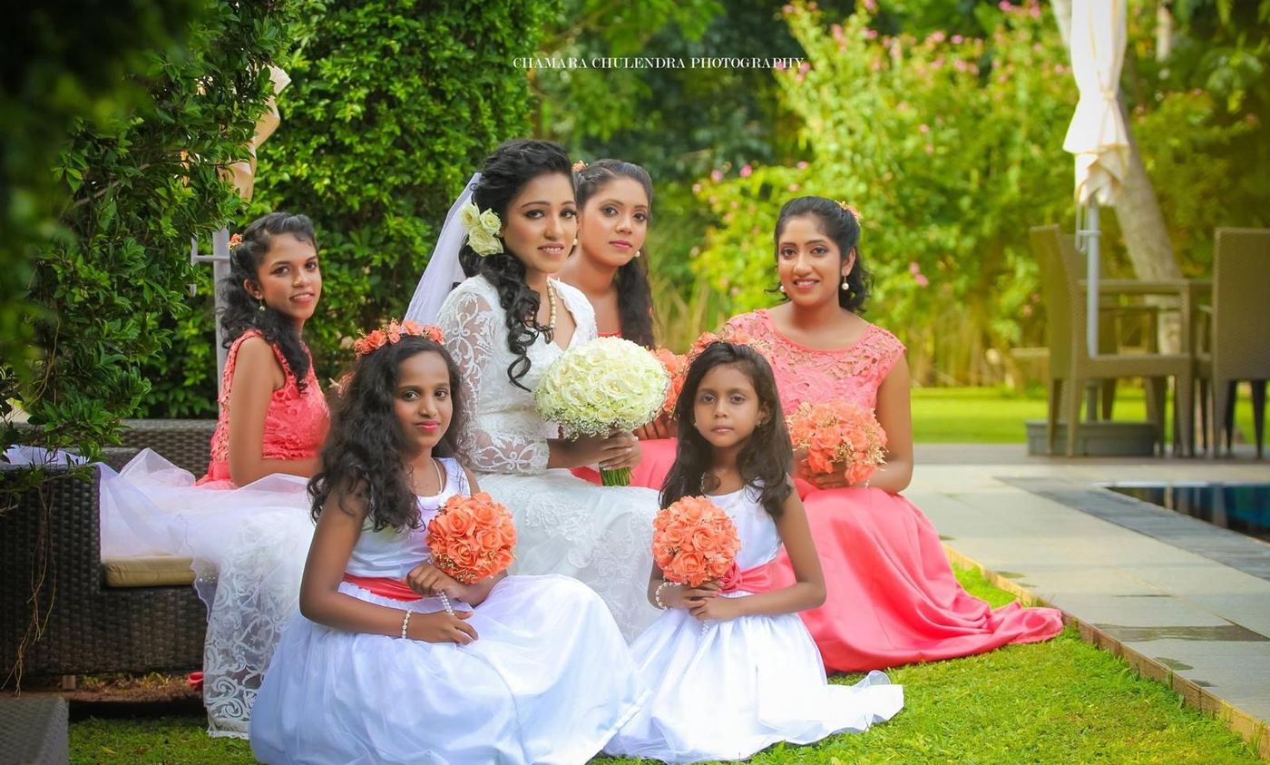 Bride with her bridesmaids and flower girls
