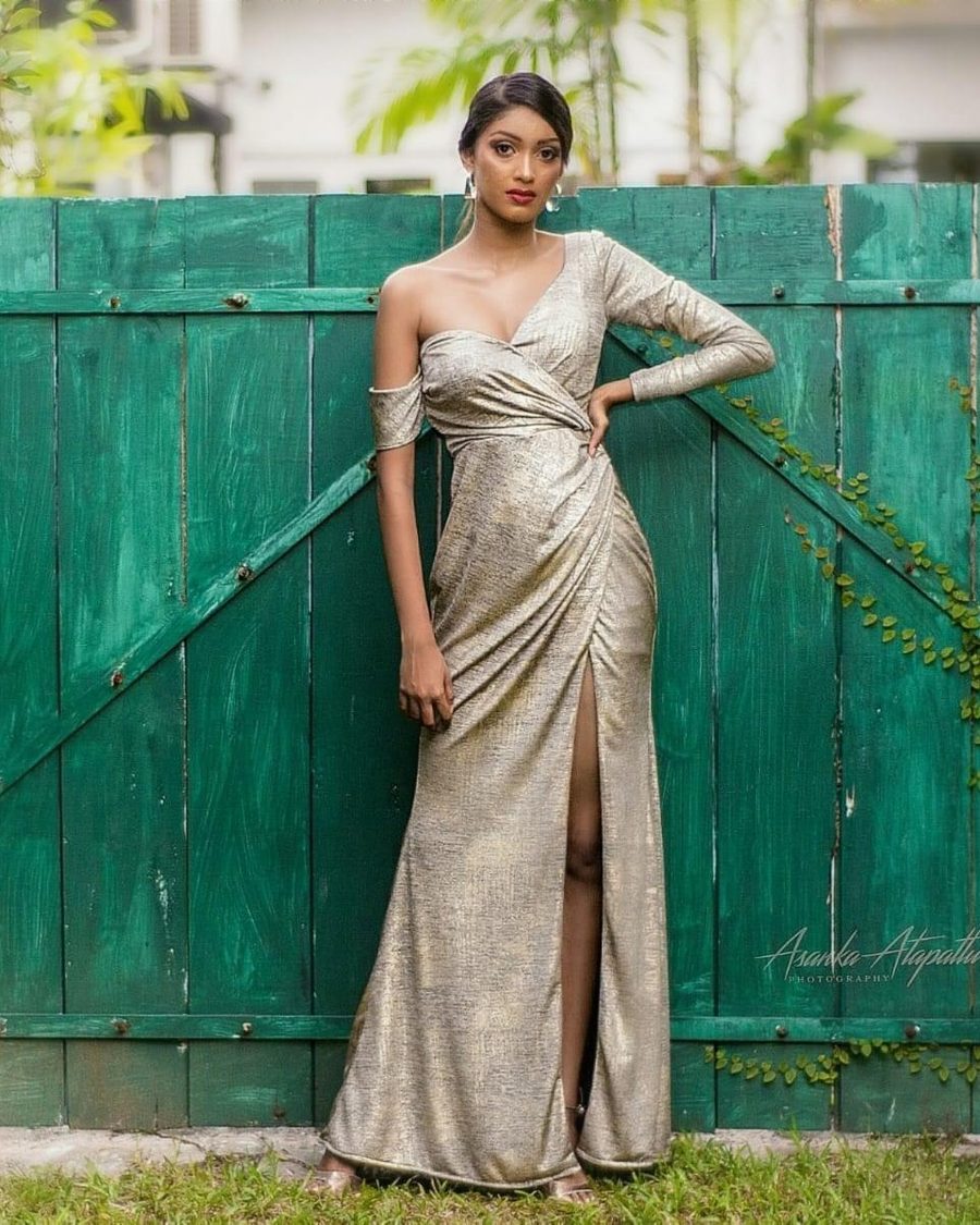 Client styled for a photoshoot in a gold gown