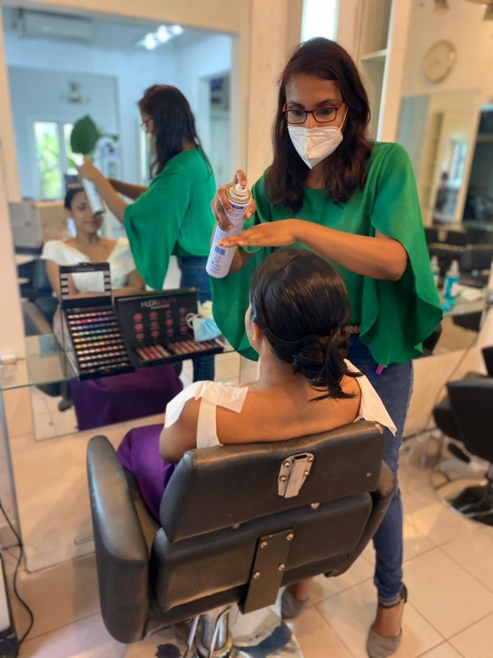 Styling chair and brass mirror at the salon
